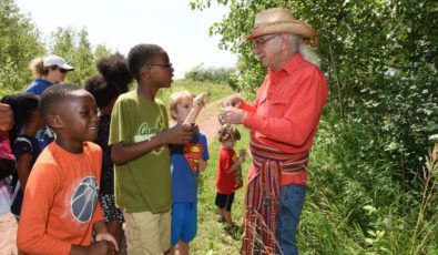 Kids on a nature walk during Tuesdays on the Trail events in Durham Region