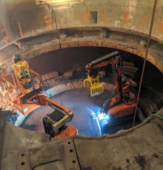 A worker flame cuts the old scroll case, which is set to be replaced as part of the G1 and G2 unit replacement at Sir Adam Beck I GS.