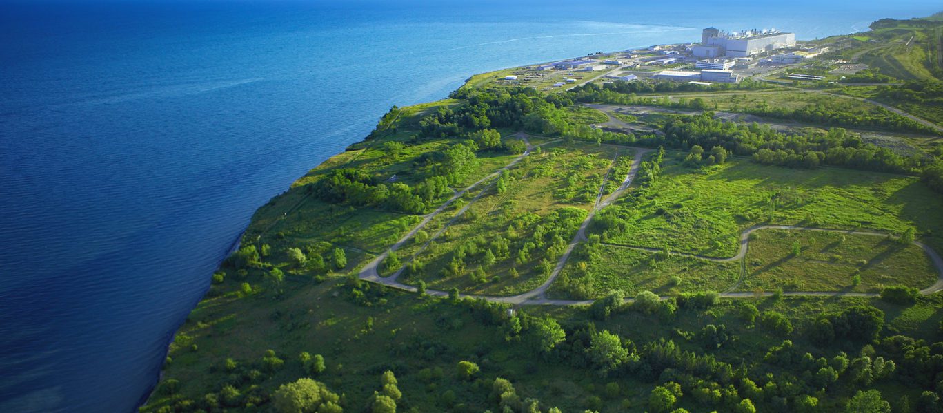 An aerial view of Darlington Nuclear Generating Station from afar.