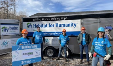 OPG employees recently helped build affordable new homes for families of Neyaashiinigmiing – also known as the Chippewas of Nawash Unceded First Nation.