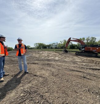 Voyageur Services' John Munnings and Scott Pittaro survey the Darlington New Nuclear Project site.