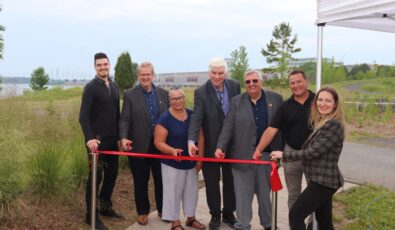 •	SHDVC Grand Opening 2024.jpg: (L-R): Michael Lazaris, Office of MPP Nolan Quinn; Rob Ball, President of M. Sullivan & Son Ltd.; Chief April Adams-Phillips, Tsi Snaihne District; Bruce Robertson, OPG VP Eastern Operations; Denis Sabourin, Councillor, City of Cornwall; Kelly Mitchell, President, Iroquois Sullivan Joint Venture; Amanda Griener, Director Asset & Project Management, OPG Eastern Operations.