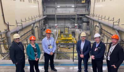 OPG and Nordion employees survey Darlington Nuclear's recently refurbished Unit 1, which has been modified to produce life-saving Cobalt-60 isotopes.